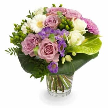 Orchid Garden Flower Bouquet Cluster-Style Bouquet In Pastel Tones Featuring Roses, Phalaenopsis Orchids, Germini, Eustoma, Anthurium, And Rich Greenery.