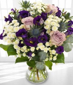 English Hedgerow Flower Bouquet featuring lavender Roses, purple Lisianthus, and white Chrysanthemums arranged in a stylish aqua pack.