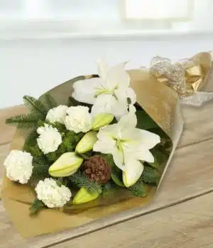 Elegance Flower Bouquet Flat Bouquet Featuring White Lilies And Carnations Accented By Green Foliage, Finished With A Festive Bow.