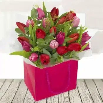 Beloved Tulips Flower Bouquet A Bouquet Of Fresh Pink And Red Tulips Arranged In A Matching Gift Bag, Hand-Tied And Ready For Display, Perfect For Valentine’s Day.