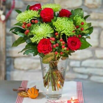 Merry Christmas Flower Bouquet A Festive Bouquet Of Red Roses, Hypericum Berries, And Lime Green Blooms – Hand-Tied For A Magical Christmas Gift Or Seasonal Décor.