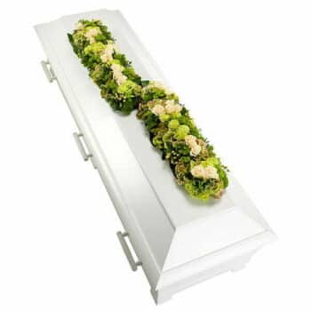 Neutral Coffin Topper Featuring Six Floral Bars In White And Green Tones With Roses, Lilies, And Lush Greenery Arranged Elegantly.