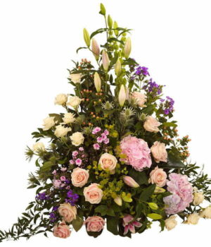 Luxury Pastel Flower Arrangement Featuring Pink And Cream Roses, Pink Lilies, Hydrangeas, Pink And Purple Phlox, And Fresh Green Foliage.