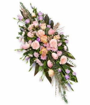 Pink And Mauve Double-Ended Spray Featuring Pink Roses, Tulips, Carnations, Genista, Lavender Veronica, Lisianthus, And Greenery.