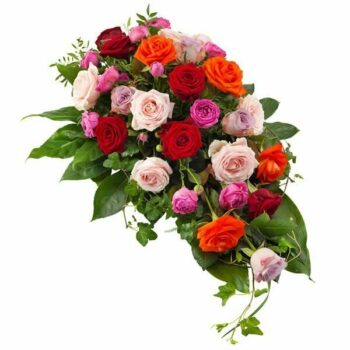 Colourful Roses Spray Featuring A Mix Of Roses In Various Shades Arranged On A Bed Of Lush Greenery As A Funeral Tribute.