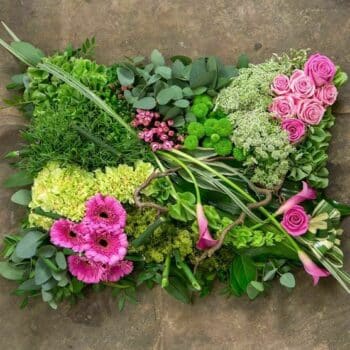 Woodland Pillow Flower Bouquet Featuring Pink Calla Lilies, Pink Germini, Green Spray Chrysanthemums, Green Carnations, Dill, Seasonal Foliage, And China Grass.