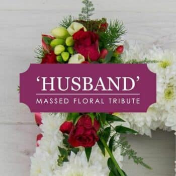 Husband Tribute Lettering Floral Lettering Tribute Spelling “Husband” With A White Chrysanthemum Base And Ribbon Edging In A Choice Of Masculine Or Neutral Tones.