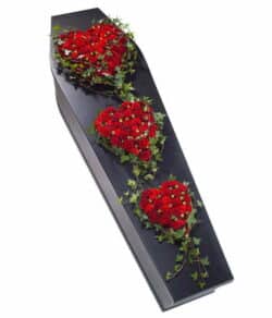 Rose Heart Trio Coffin Spray featuring three heart-shaped arrangements of red roses in graduated sizes with elegant greenery.