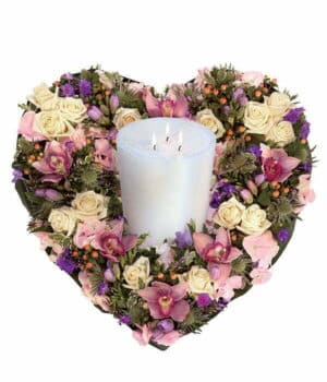 Pastel Heart &Amp; Candle Tribute Pastel Heart-Shaped Urn Wreath Featuring Cream Roses, Purple Phlox, Freesia, Pink Hypericum, Orchids, Hydrangea, And White Eryngium.
