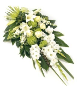 Funeral Sheaf Arrangement With Fresh Flowers And Greenery, Designed As A Traditional Tribute For A Dignified Farewell.