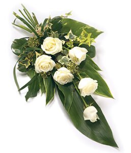 Funeral Sheaf Arrangement With Fresh Flowers And Greenery, Designed As A Traditional Tribute For A Dignified Farewell