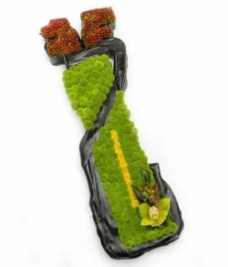 Golf bag tribute made with fresh blooms, designed as a personalised funeral arrangement for a golf lover.