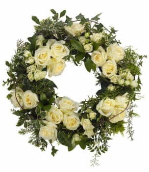 White Flower Wreath Round White Floral Wreath With White Roses, Delicate Jasmine, And A Generous Mix Of Natural Green Foliage.