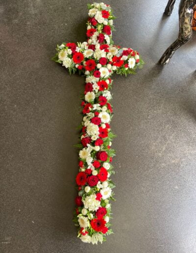 Red And White Cross Funeral Tribute