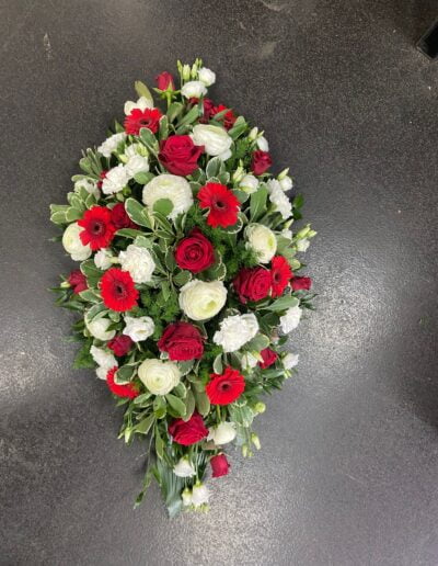 Red And White Spray Funeral Tribute