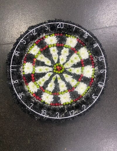 A Dart Board In Flowers
