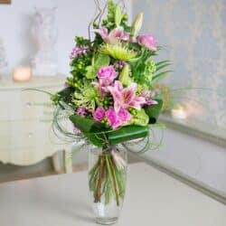 Sweet Candy Flower Bouquet featuring hot pink lilies and lime blooms in a modern hand-tied arrangement for a stunning, ultra-chic floral gift.